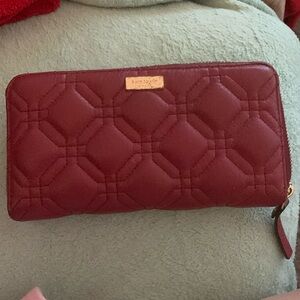Kate spade burgundy quilted leather zippy wallet